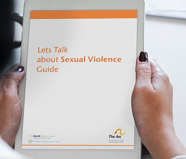 Person holding tablet with "Let's Talk About Sexual Violence" Guide from The Arc on screen